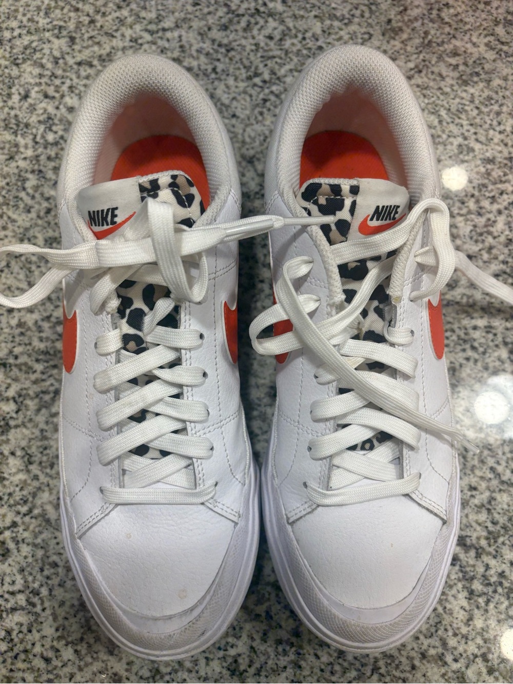 Nike Women’s White Sneakers with Orange Swoosh and Leopard Tongue